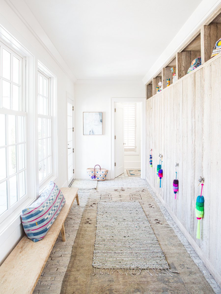7 Ways to Layer Rugs on Carpet That Will Cost Less Than Replacing