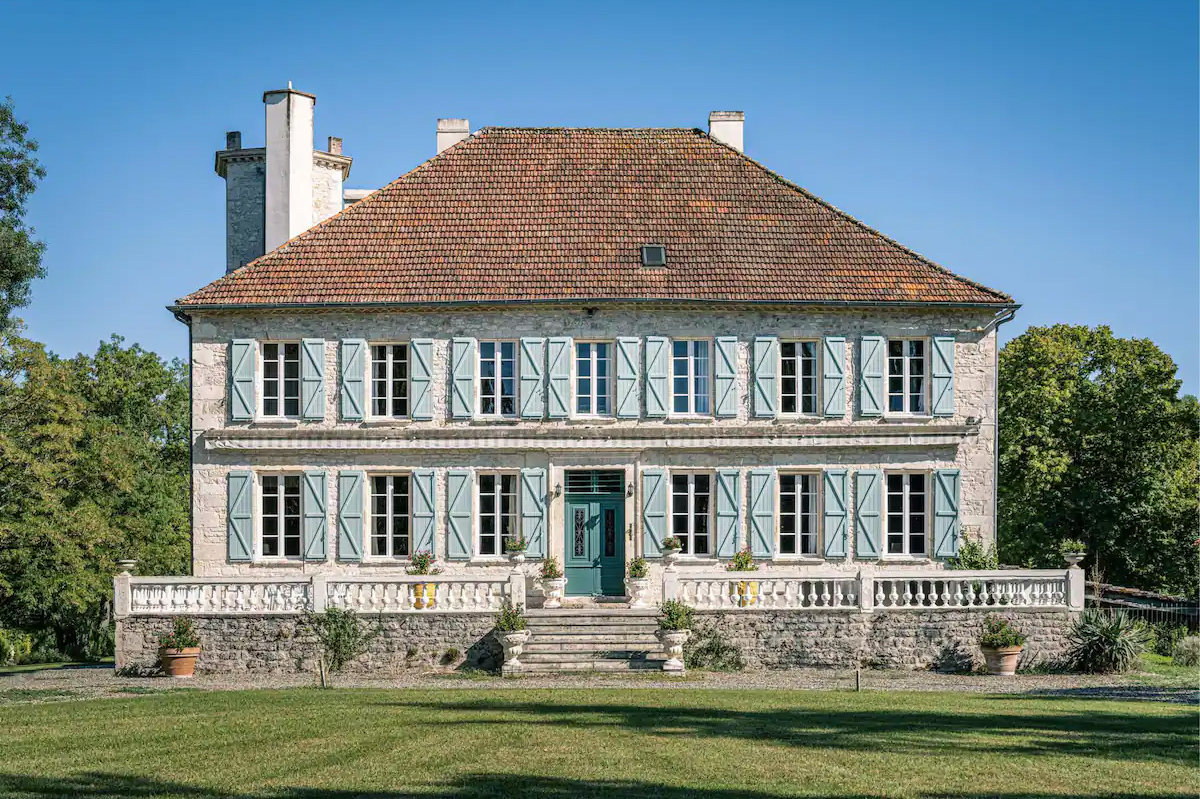 Airbnb castle in France with blue shutters