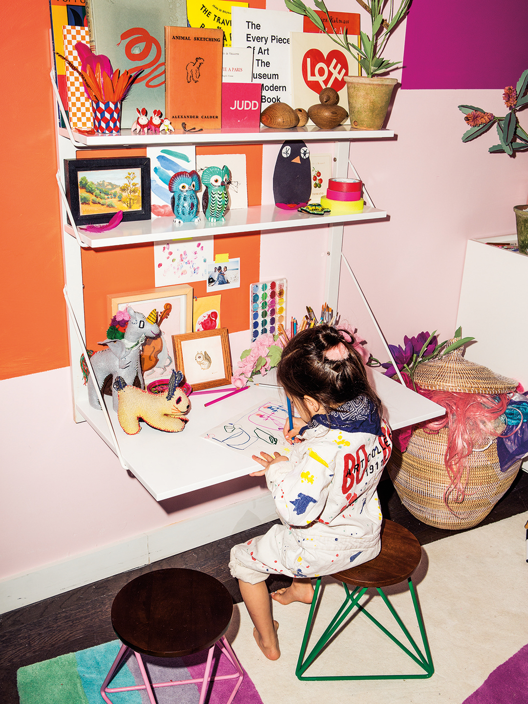 Little girl sitting at desk