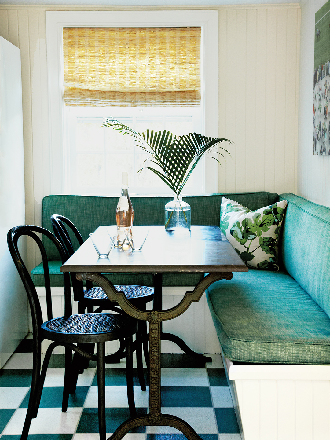 green banquette seating in kitchen