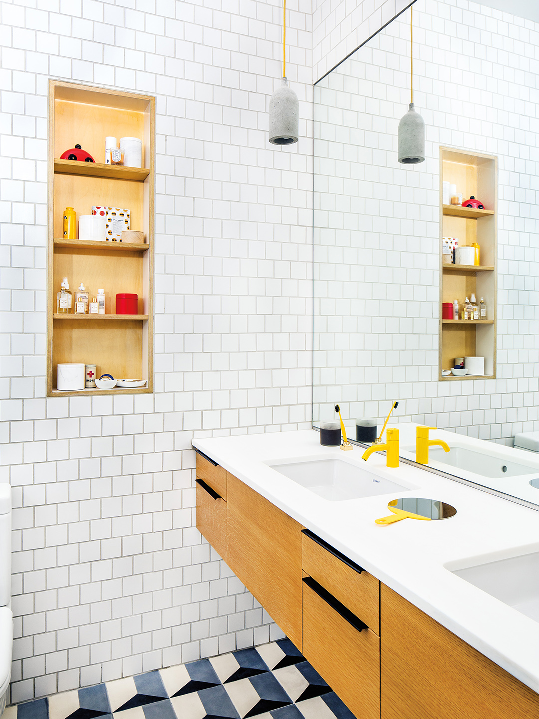 Bathroom with hexagon tile and yellow faucet