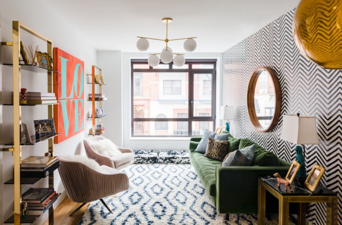 living room with chevron wallpaper