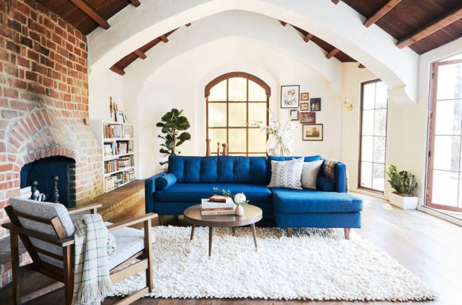 living room with blue couch