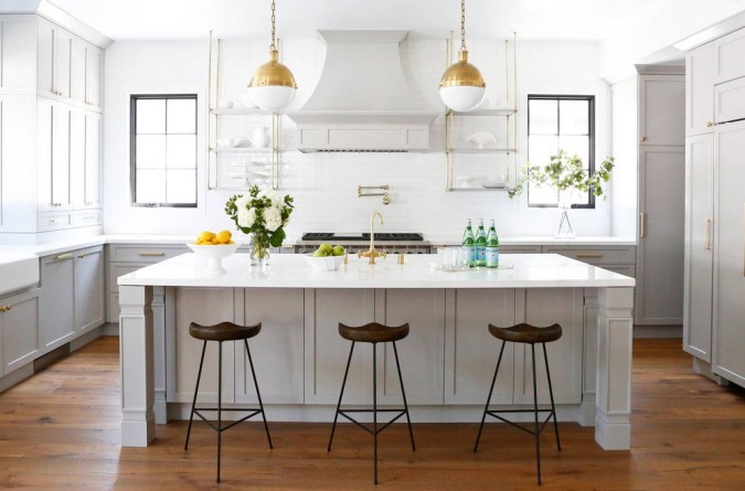 large kitchen island with globe pendant lights