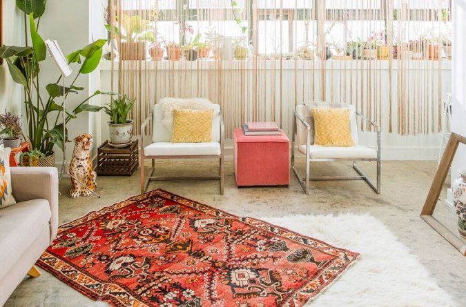 living room with rug on top of rug