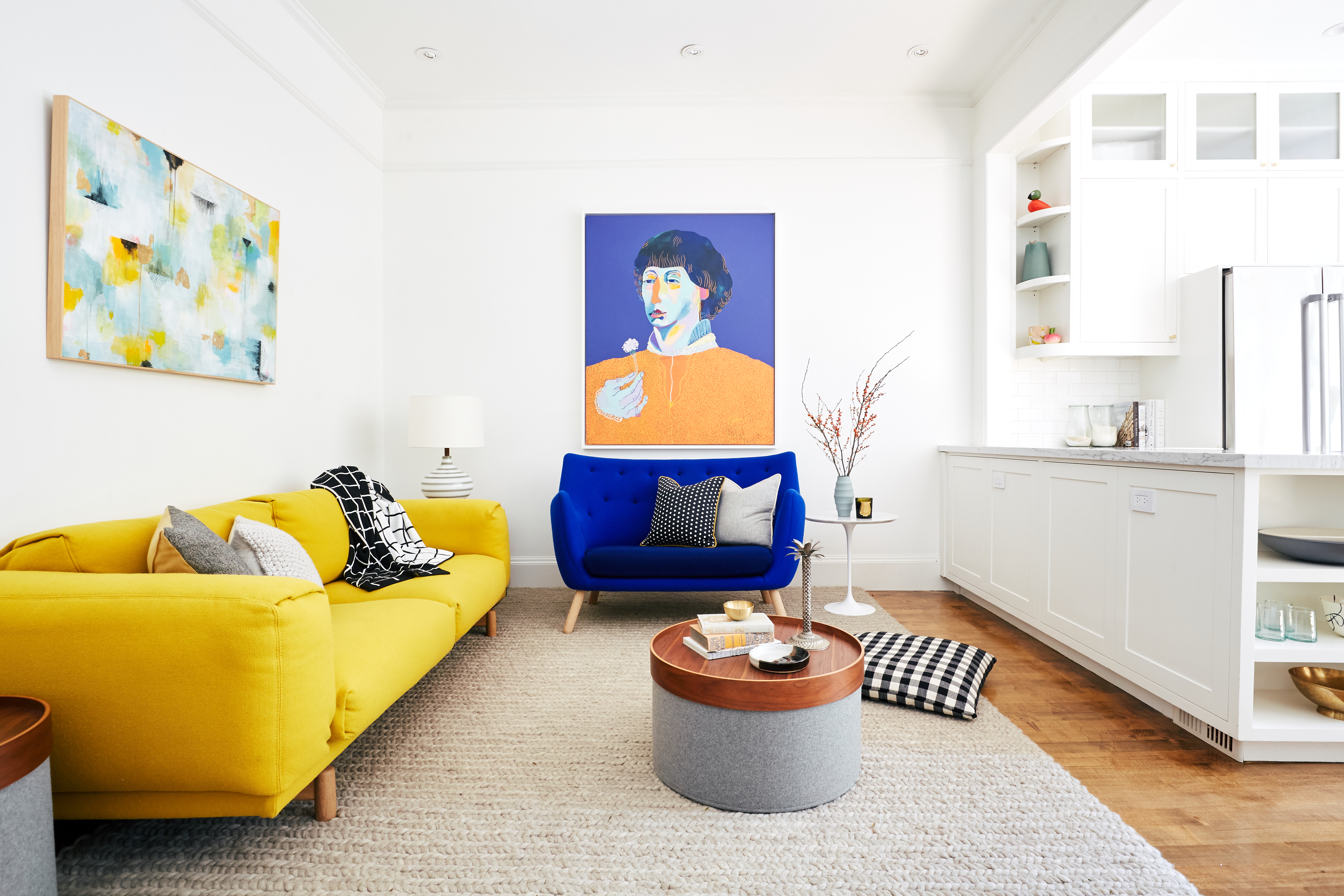 living room with yellow and blue couches