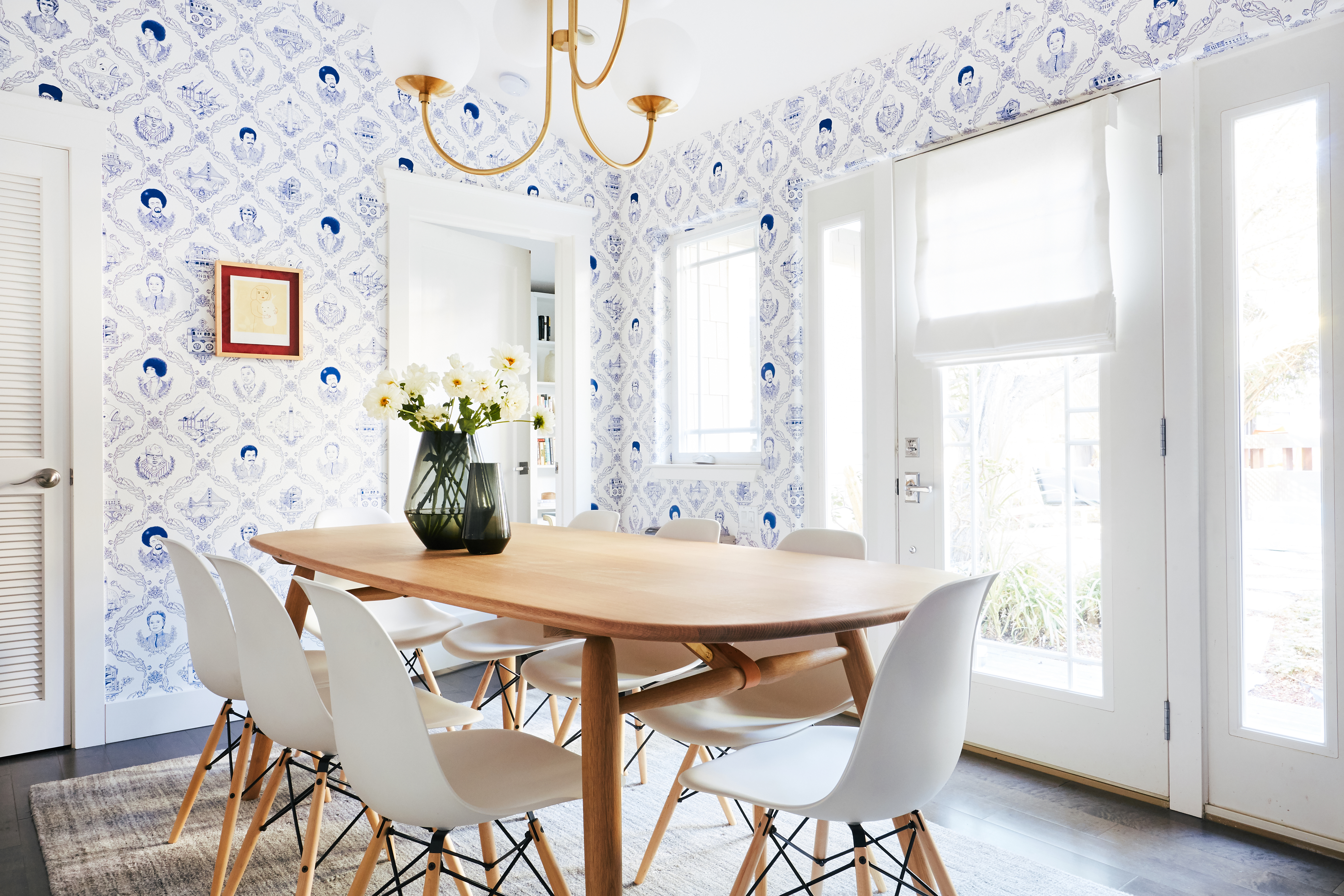 dining room with playful blue and white wallpaper