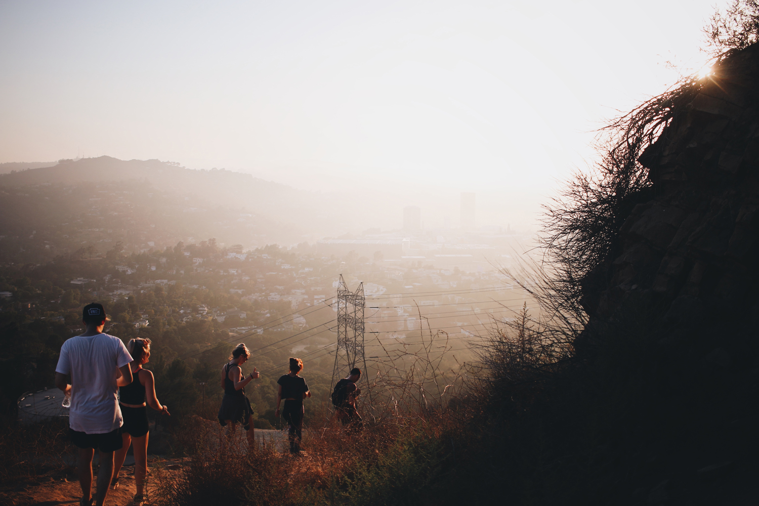 group of hikers walking downhill