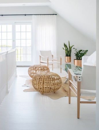 A Whitewashed Seaside Home Surprises With Pops of Color