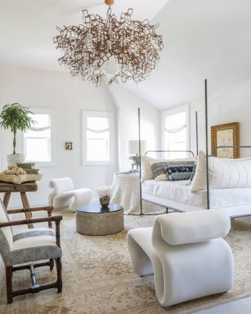 michael del piero white bedroom with contemporary chairs