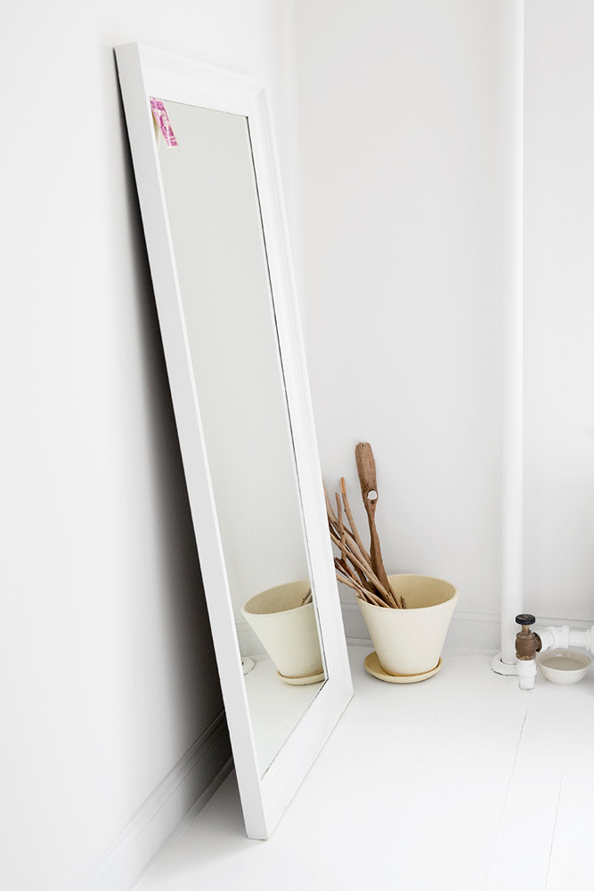 Renovating a Bathroom Turned This Apartment Into a Dream Home mirror