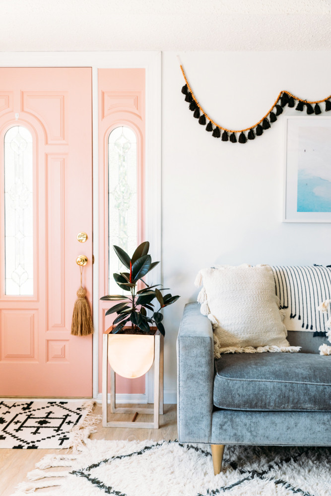 Cara Irwin Of Goldalamode Home Tour Pink Door Black Tassel Garland