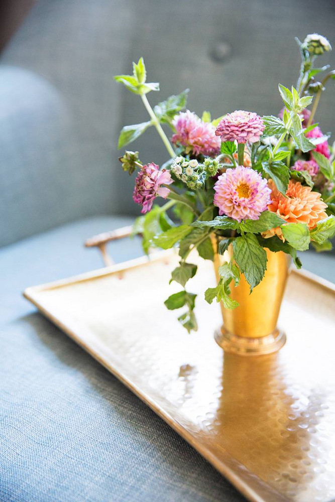 NYC Apartment Of Brooke Lucas Of The Wild Bunch Gold and Pink Flowers