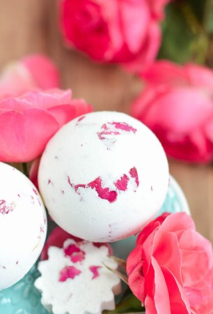 7 Fun and Fizzy DIY Bath Bomb Recipes - rose and milk bath bomb