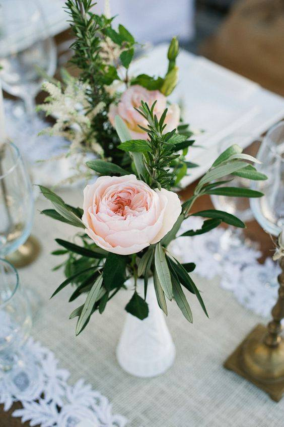 Spring Flower Arrangements pink flowers on a table