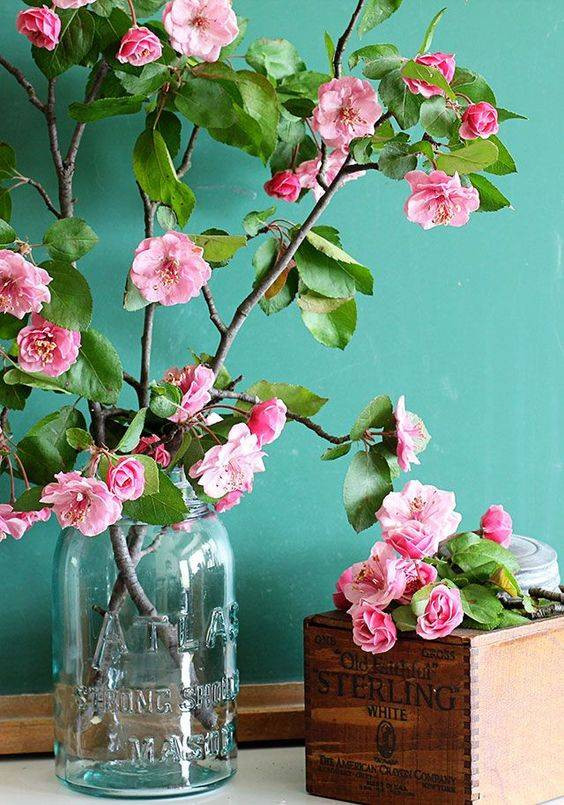 Spring Flower Arrangements pink crabapples in mason jar