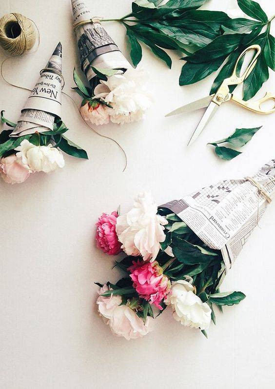 Spring Flower Arrangements peonies wrapped in newspapers