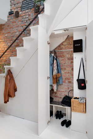 how to organize your scary cupboard under the stairs