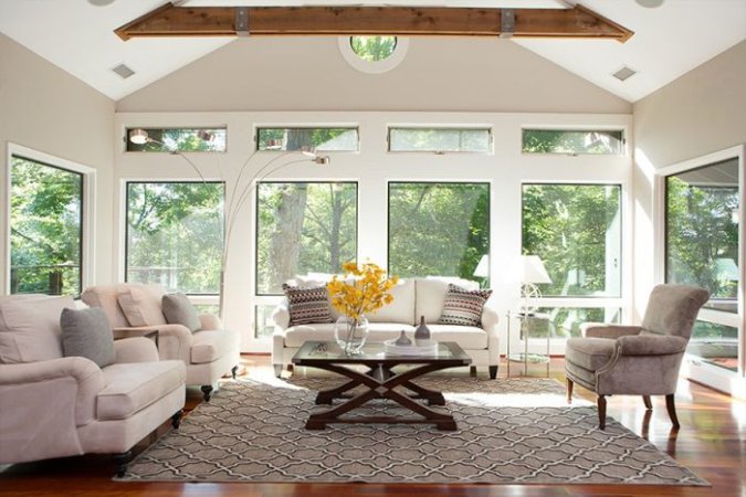 white bedroom with large windows