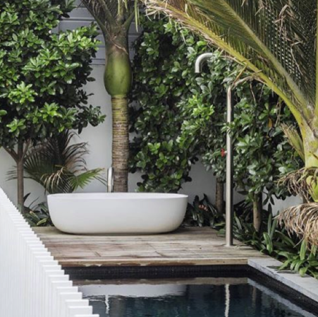 Outdoor Bathtub Ideas  white tub by a pool
