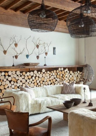 rustic interiors white living room with antlers on wall