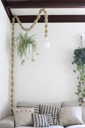 white living room with macrame wrapped bulb