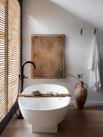 Bathroom tub with wooden caddy