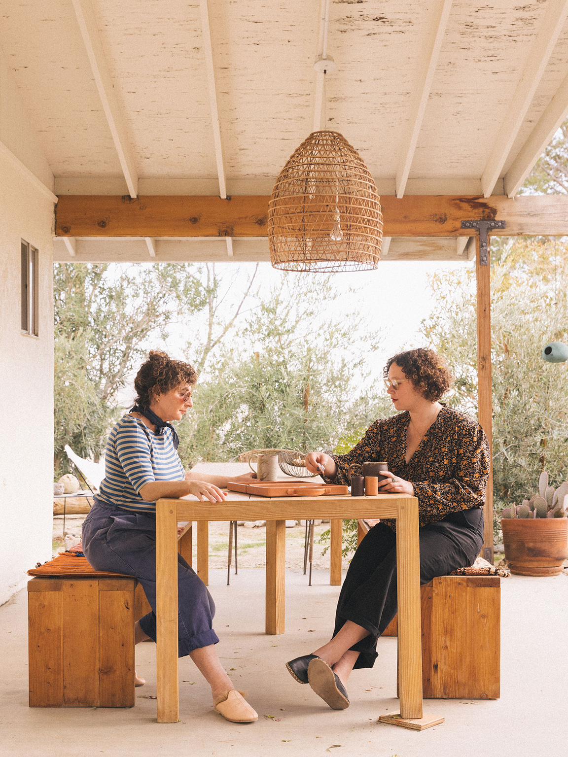 women at outdoor table