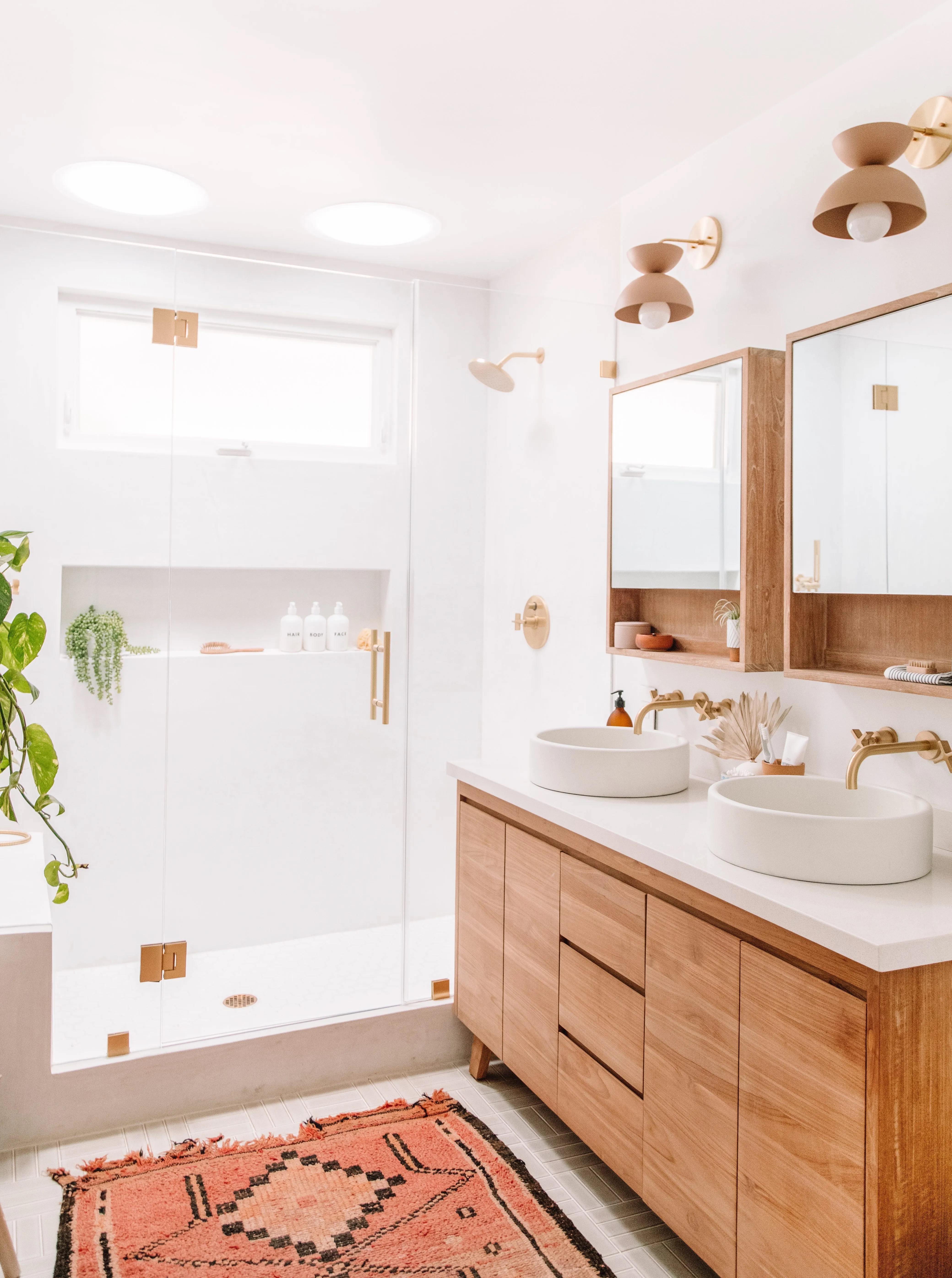 White bathroom with wood vanity