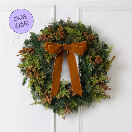  evergreen wreath with pinecones and brown bow