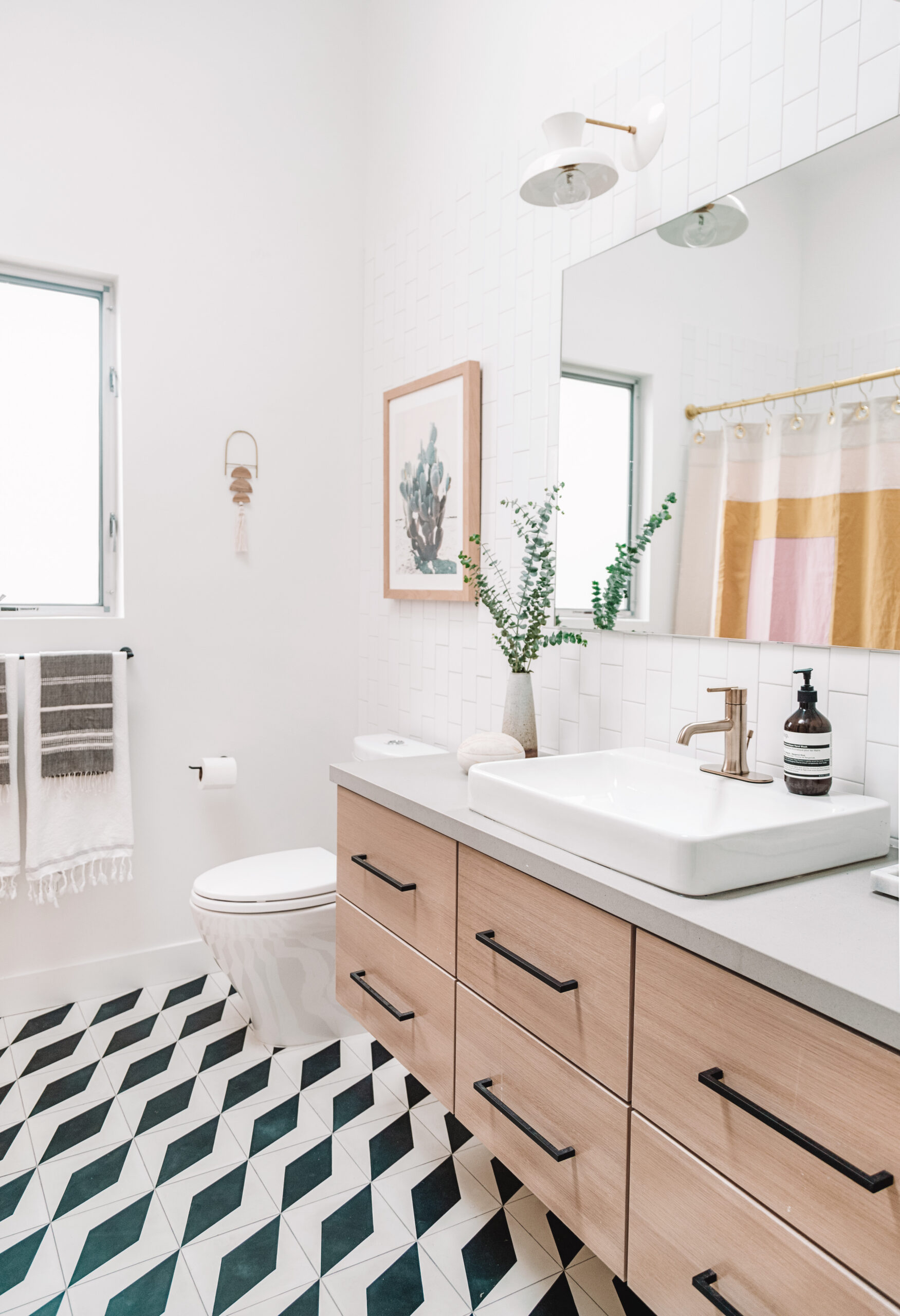 Bathroom with patterned tile floors