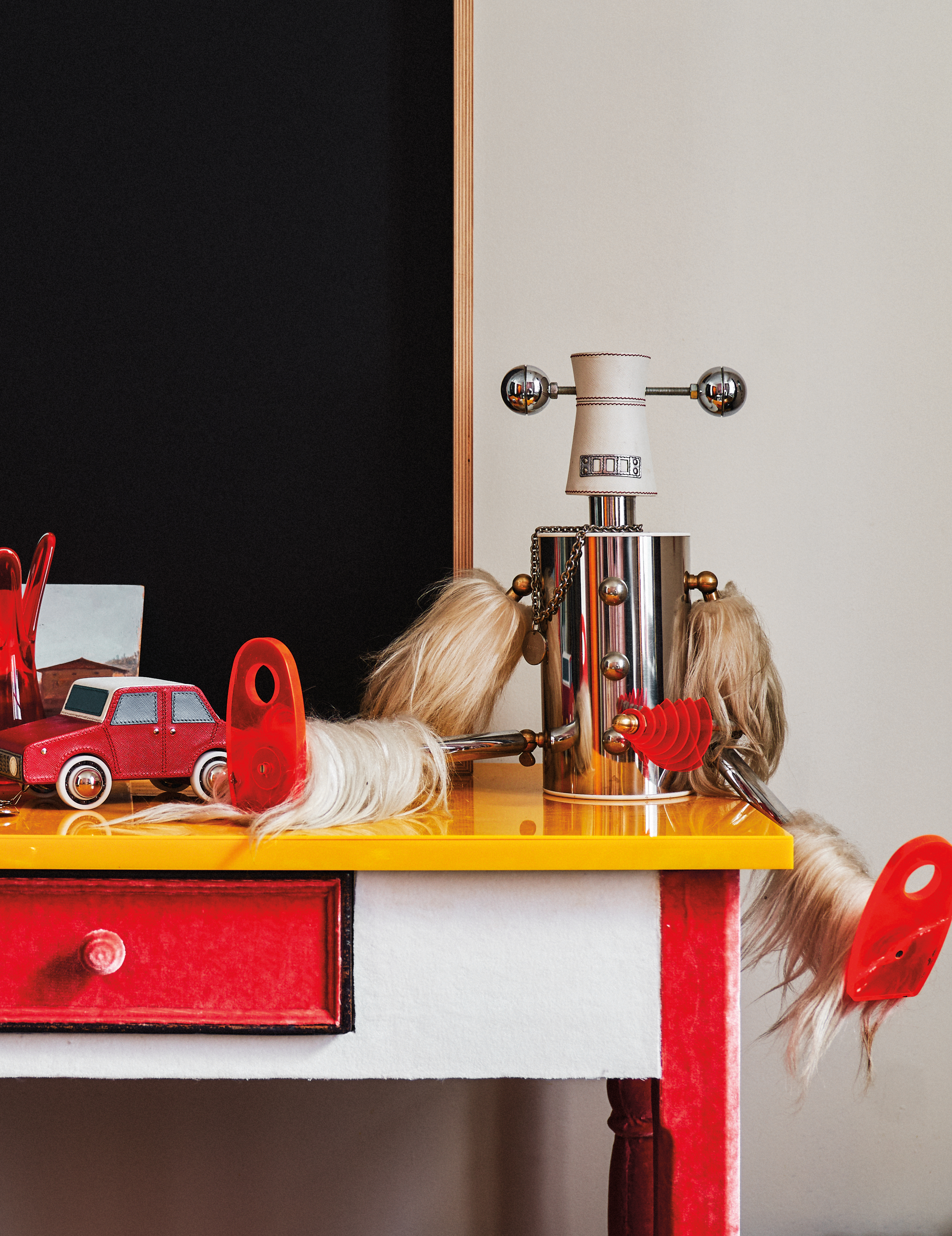 vintage robot on red and yellow table