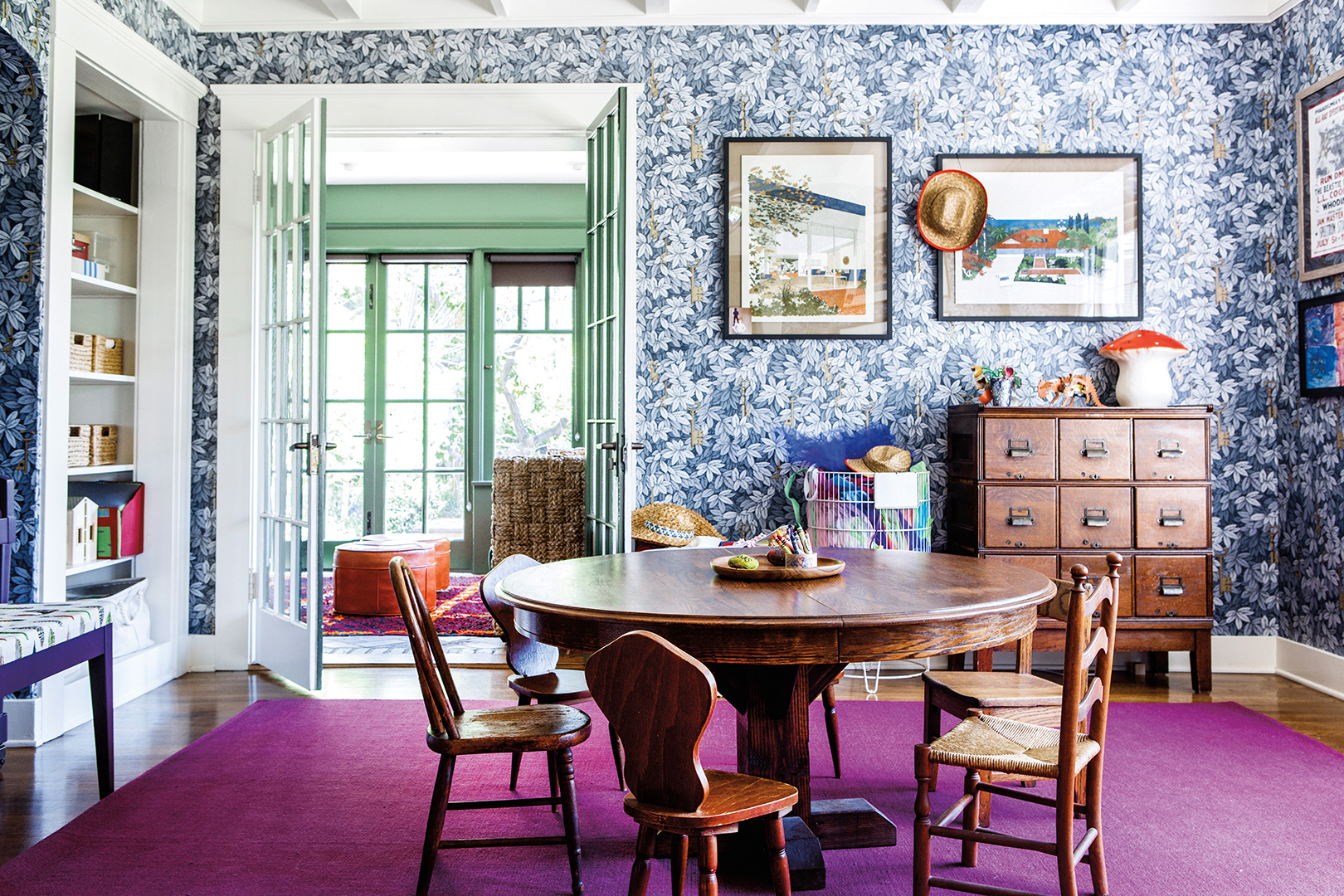 Dining room with purple floor and blue wallpaper