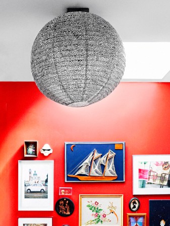 red room with lantern with scribbles