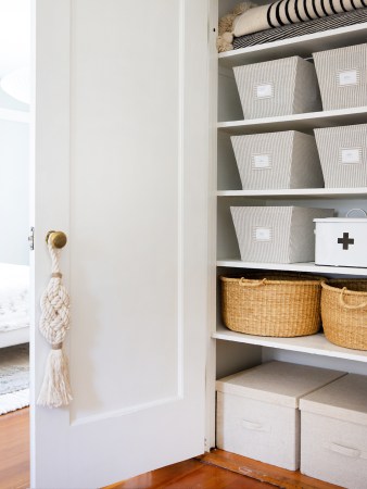 linen boxes in closet