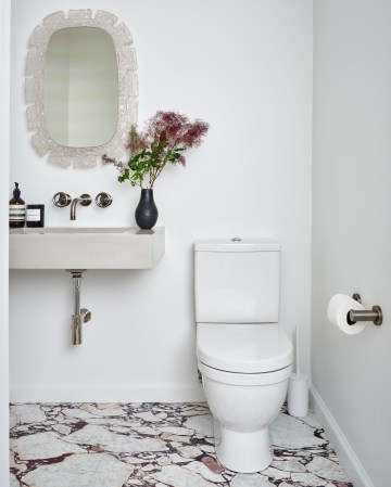 Two Tiny Bathroom Makeovers With One Stunning Marble Slab in Common