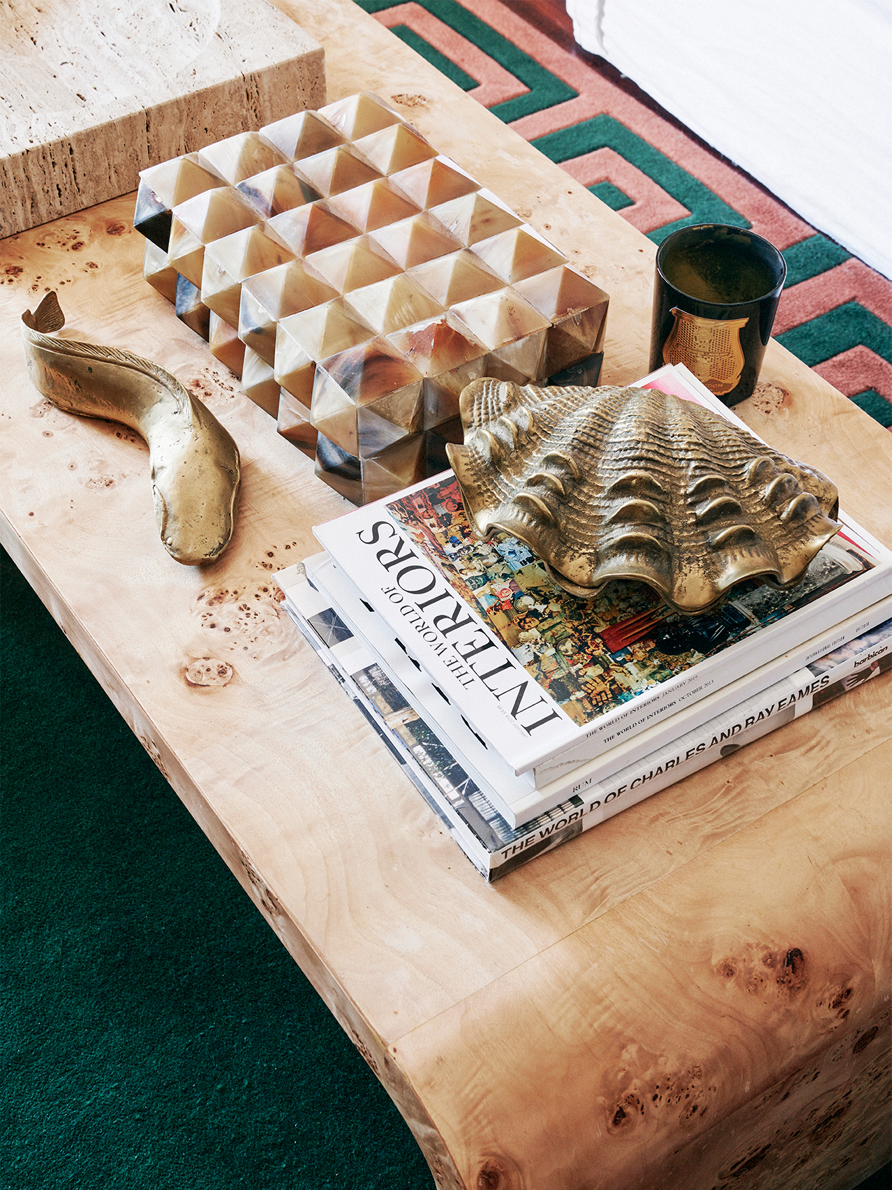 Wooden coffee table with knick-knacks.
