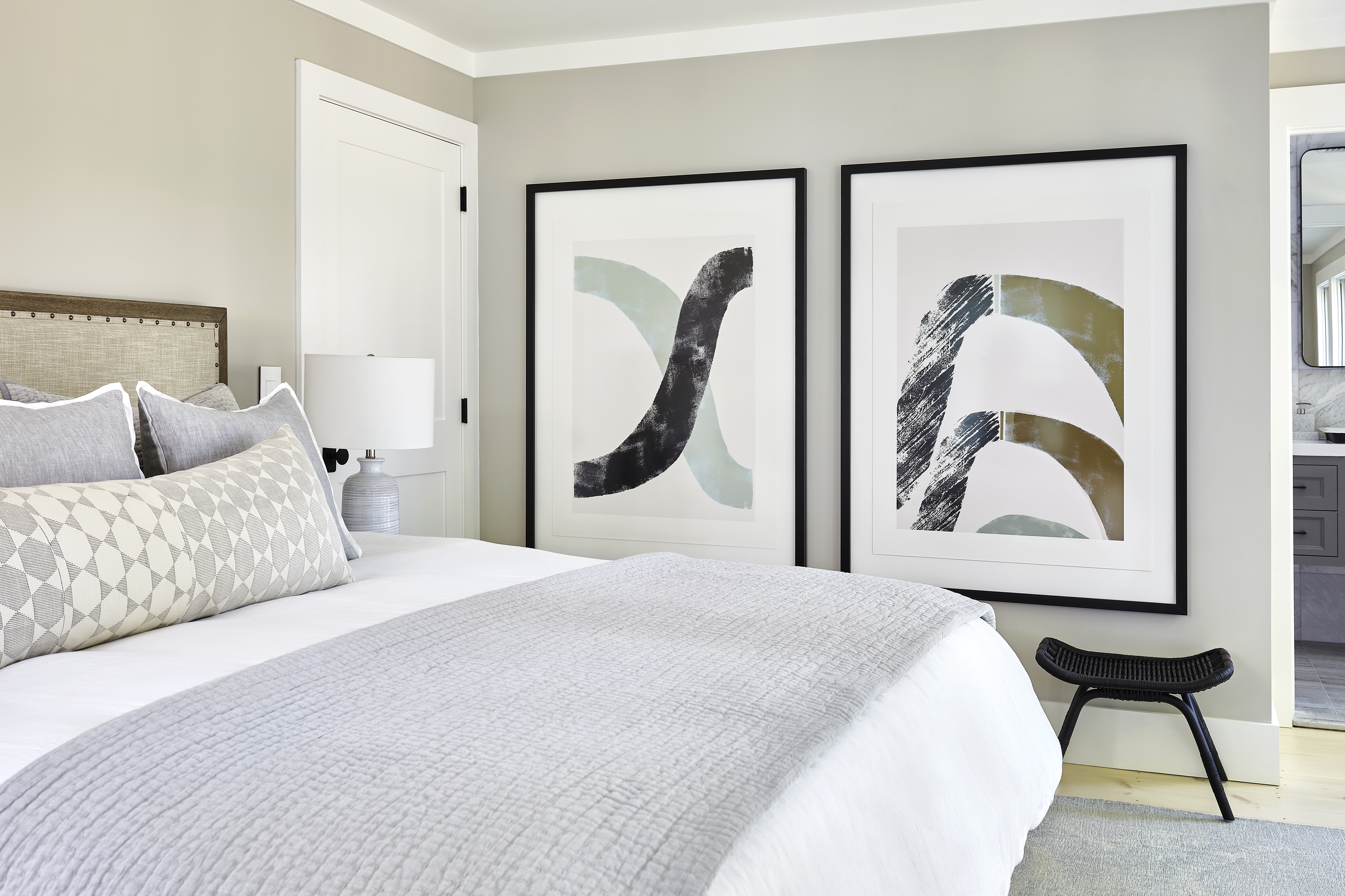 Neutral toned bedroom with large scale art.