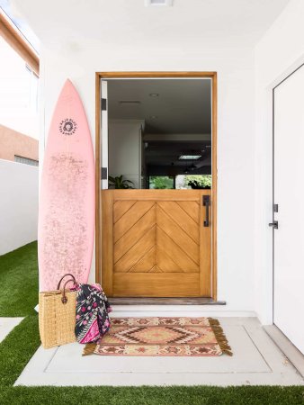 solid wood front door with chevron pattern