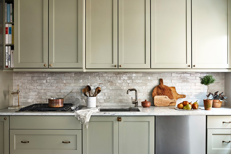 muted green kitchen cabinets