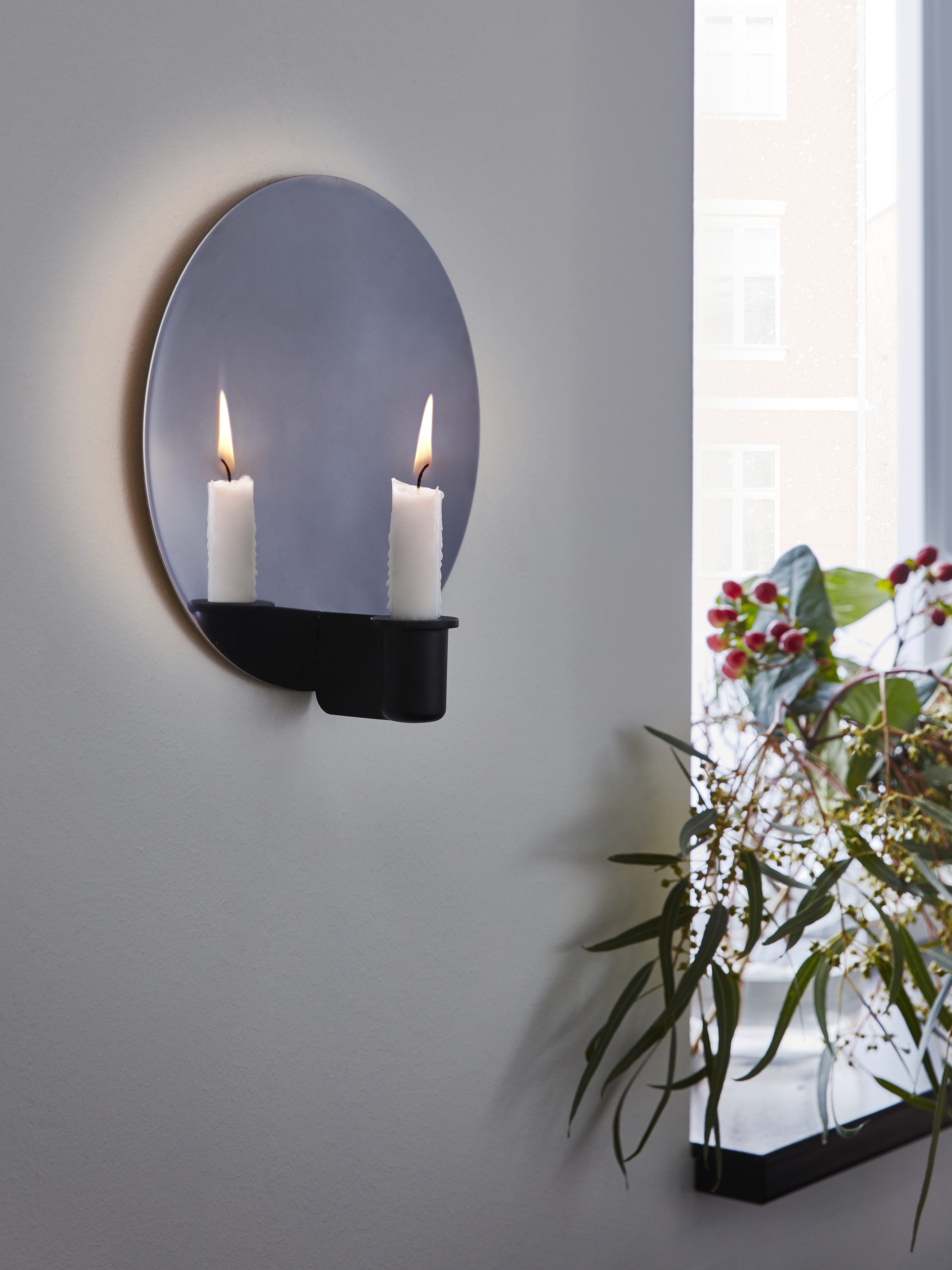 mirror-with-candlestick-holder