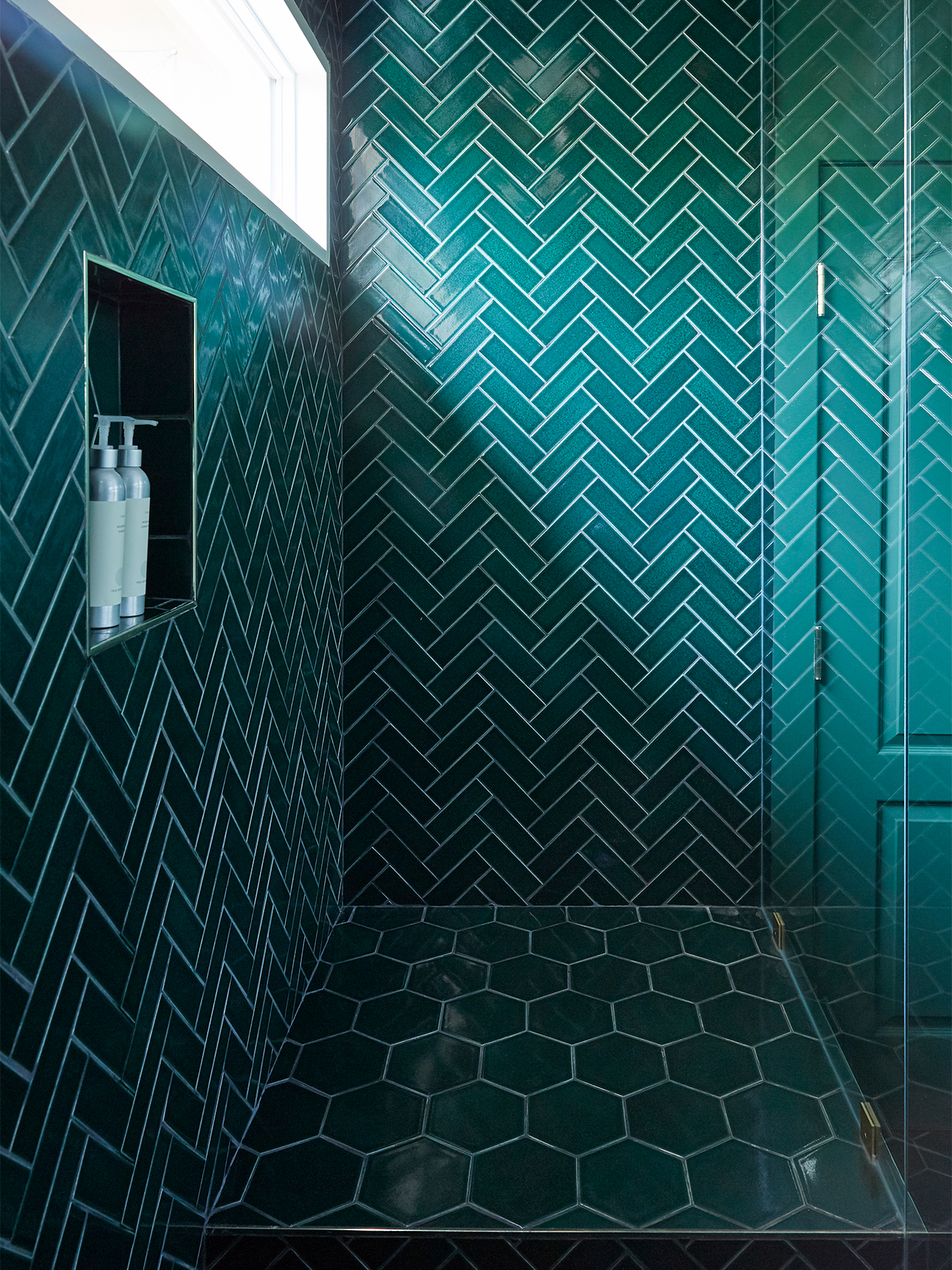 herringbone shower tiles