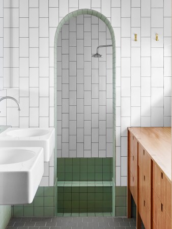 white and green subway tile bathroom