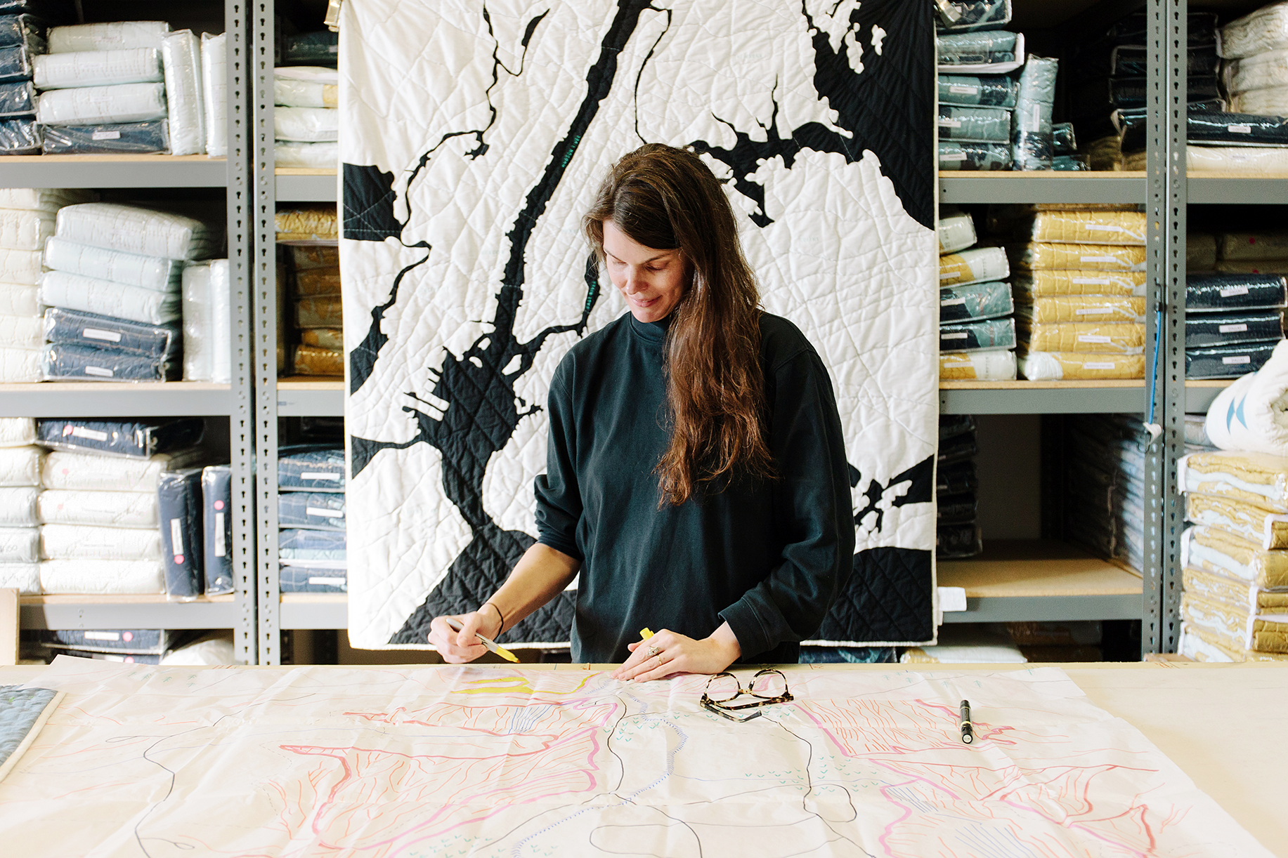 woman weaving quilt