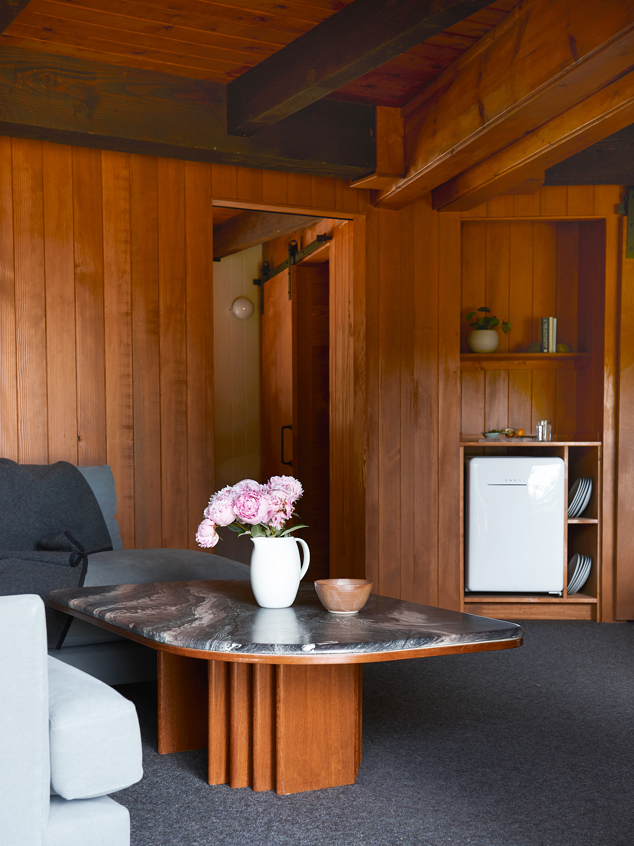 living room with wood panels