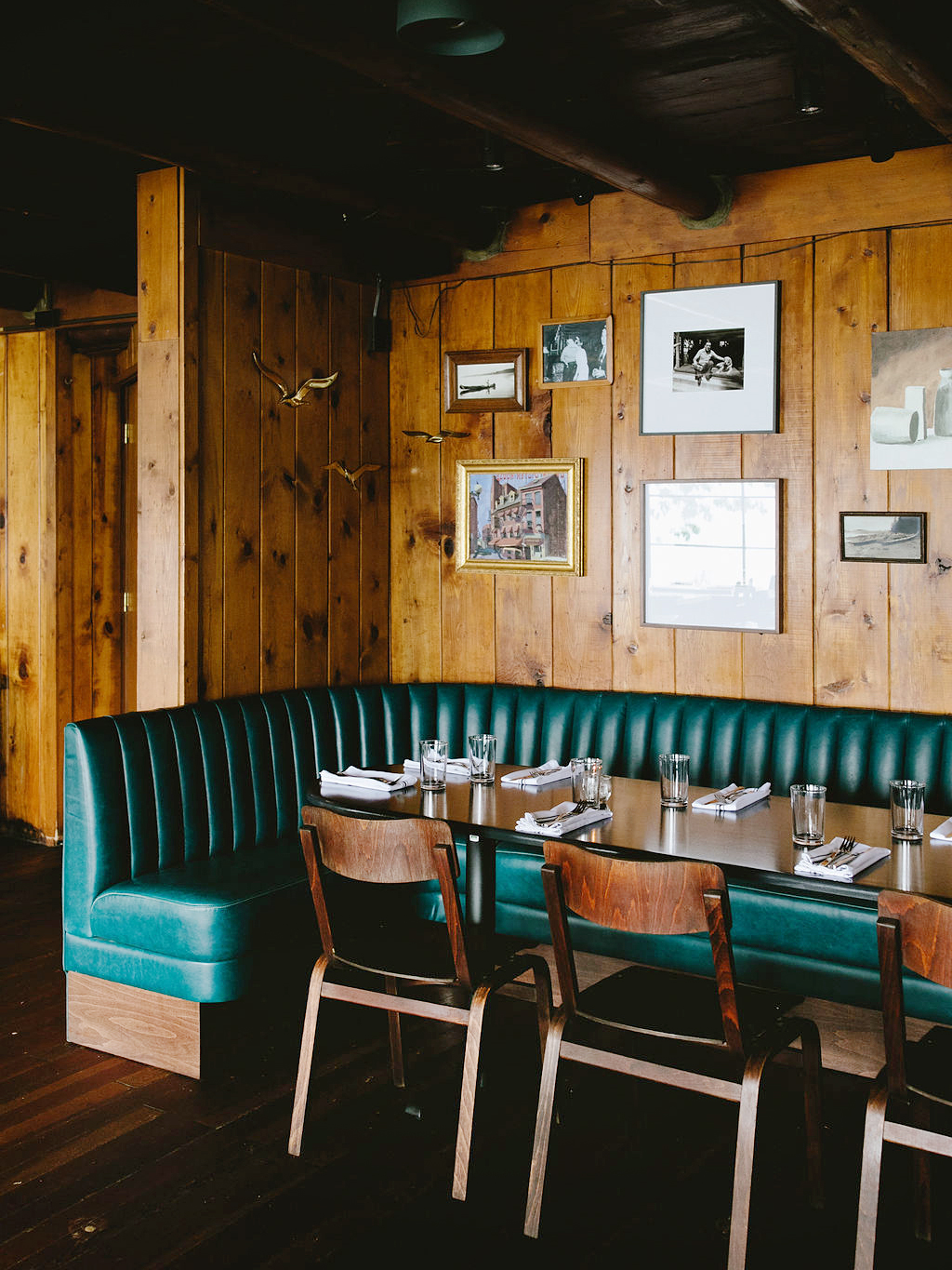 dining area with green leather bench