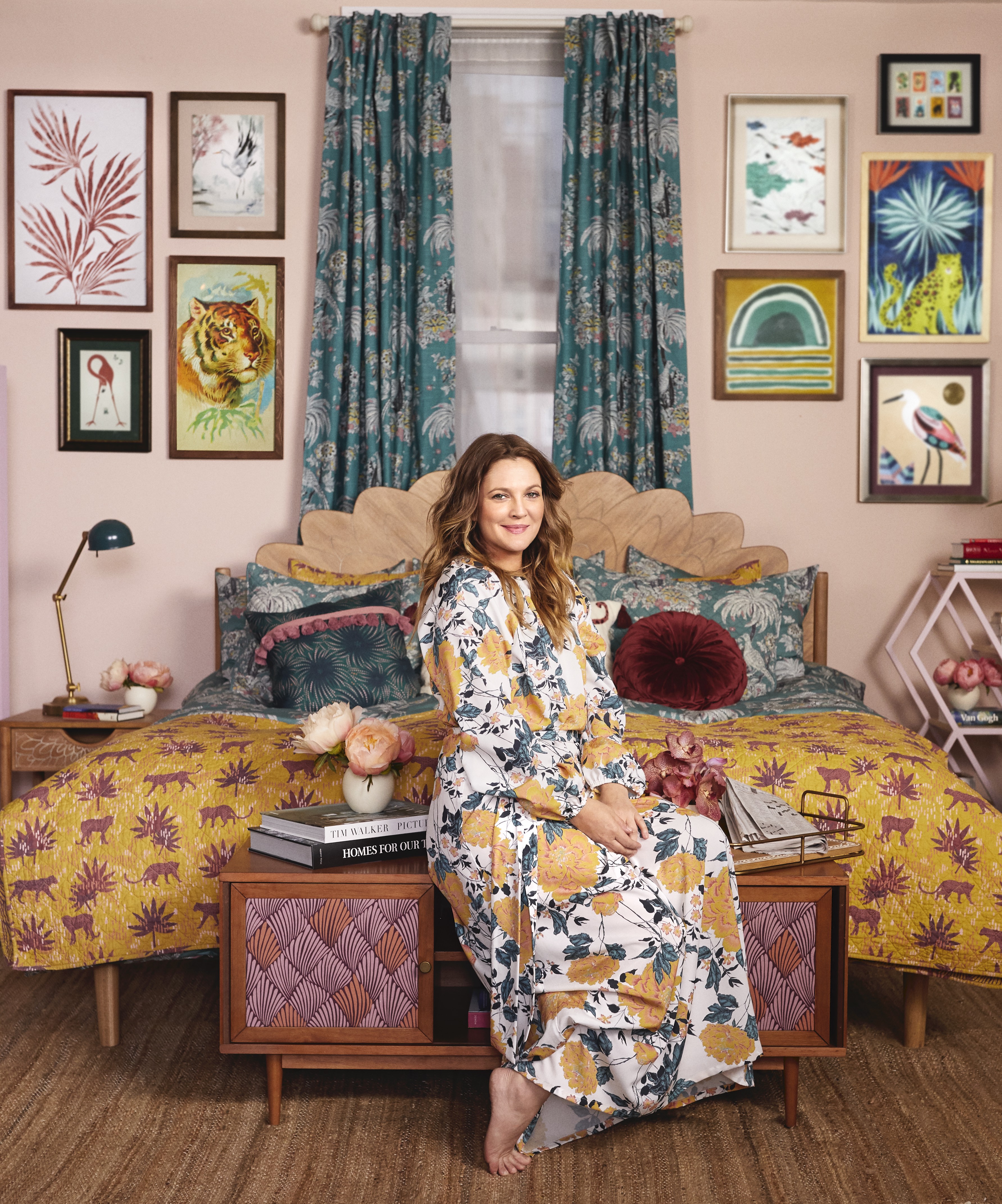 Drew Barrymore in a colorful room full of Flower Home decor.