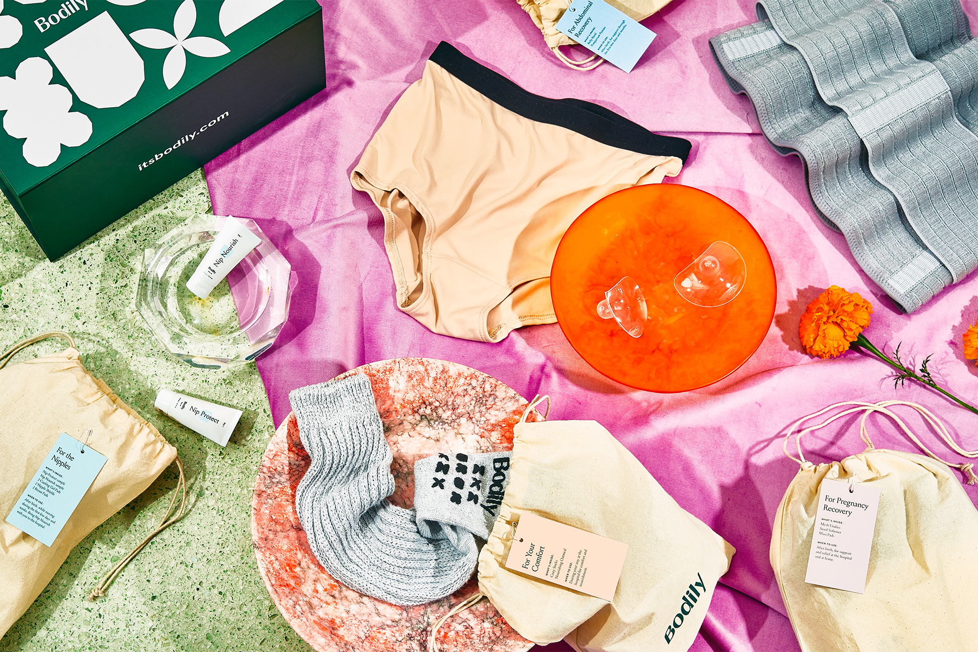 underwear and other products sprawled on a table