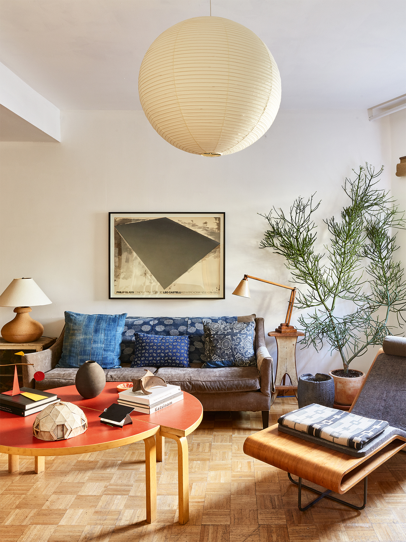 Blue pillows and Noguchi lantern in living room