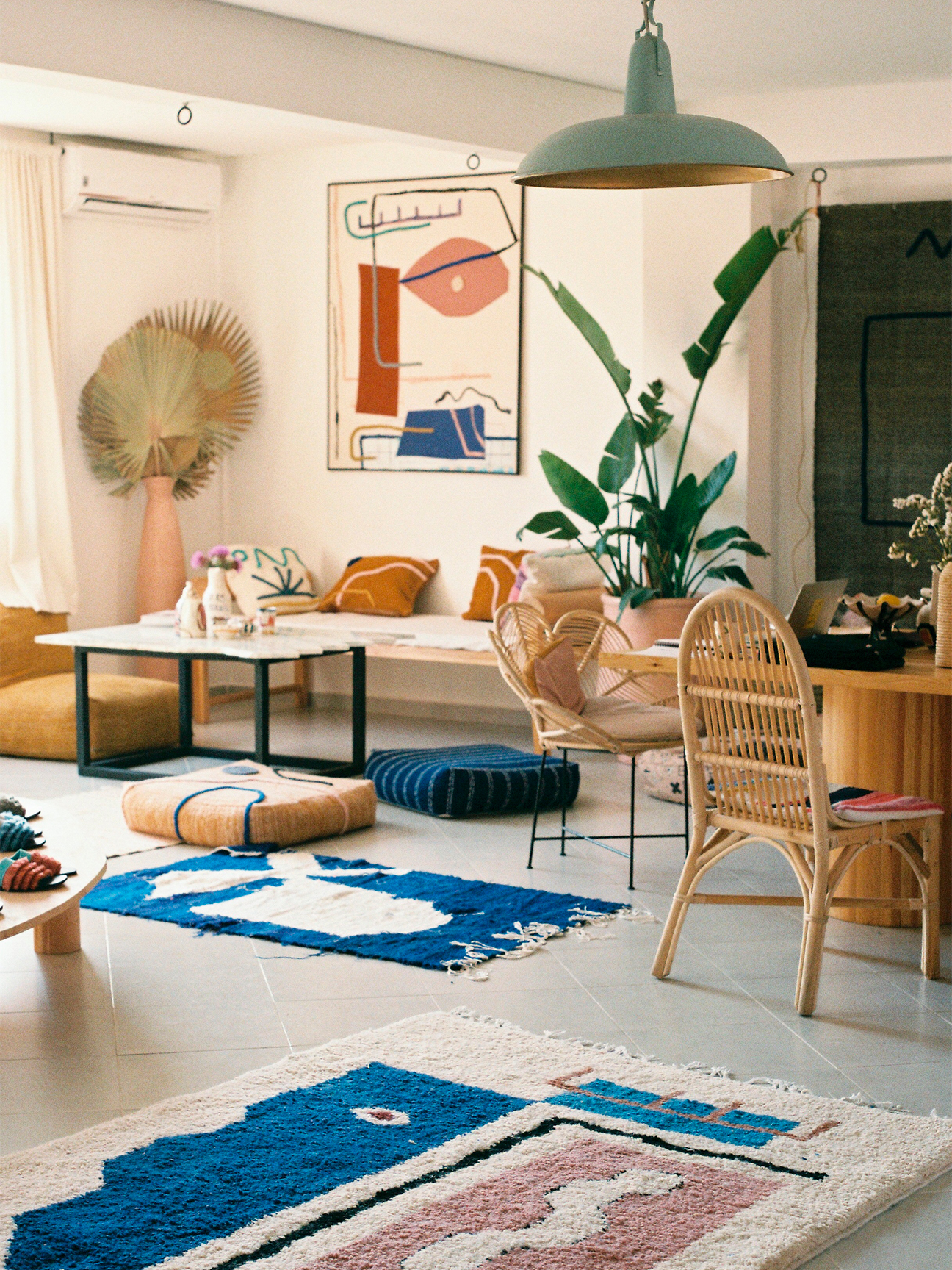 Colorful rugs and tapestry in Moroccan interior